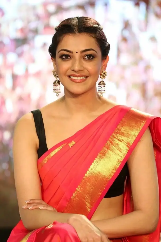 Indian Girl Kajal Aggarwal In Sleeveless Red Saree